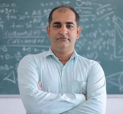 portrait-indian-male-teacher-standing-260nw-1765602338